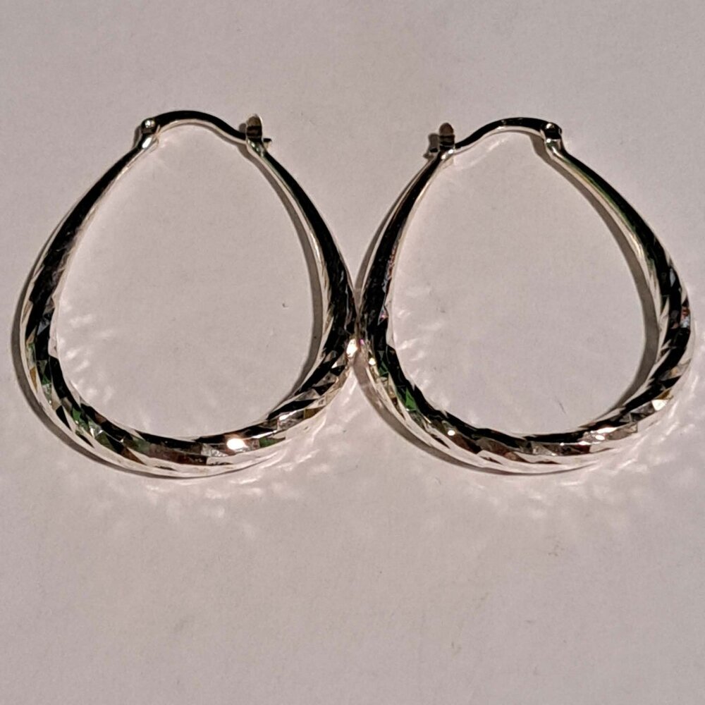 silver tear drop loop earrings